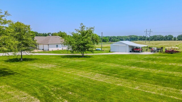 26484 State Highway 3, Kirksville, MO 63501 - view of grassy yard with an outdoor structure, a pole building, and a carport