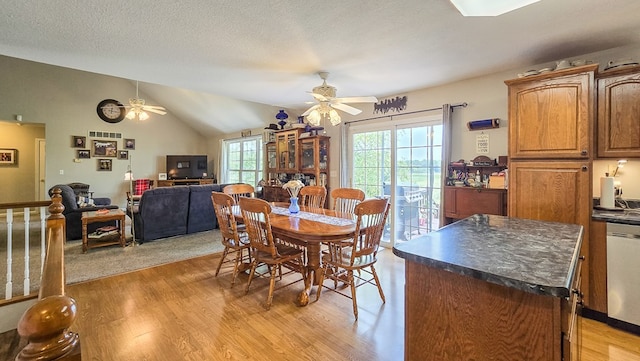 26484 State Highway 3, Kirksville, MO 63501 - dining space featuring a ceiling fan, light wood-style flooring, lofted ceiling, and a textured ceiling