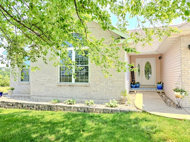 26484 State Highway 3, Kirksville, MO 63501 - view of exterior entry with brick siding and a yard