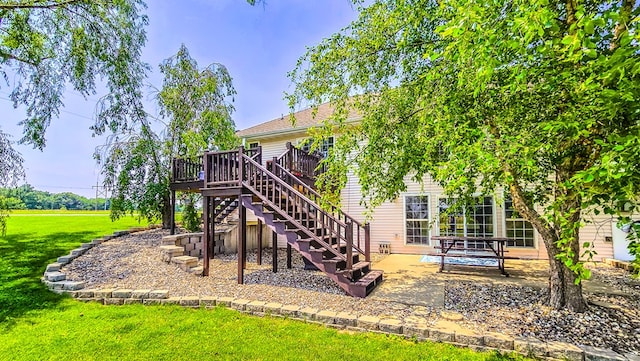 26484 State Highway 3, Kirksville, MO 63501 - view of play area with a deck, a lawn, a patio, and stairs