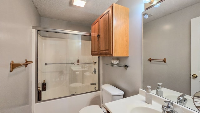 26484 State Highway 3, Kirksville, MO 63501 - bathroom with a textured ceiling, bath / shower combo with glass door, and vanity