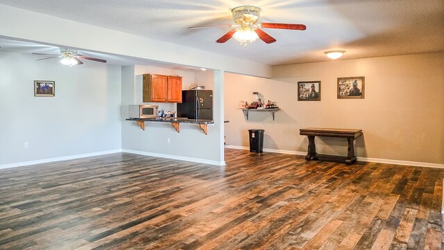 26484 State Highway 3, Kirksville, MO 63501 - living area with ceiling fan and dark wood finished floors