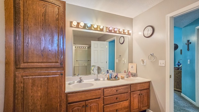 26484 State Highway 3, Kirksville, MO 63501 - bathroom with double vanity and baseboards