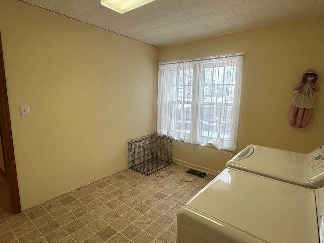 laundry room with washer and dryer