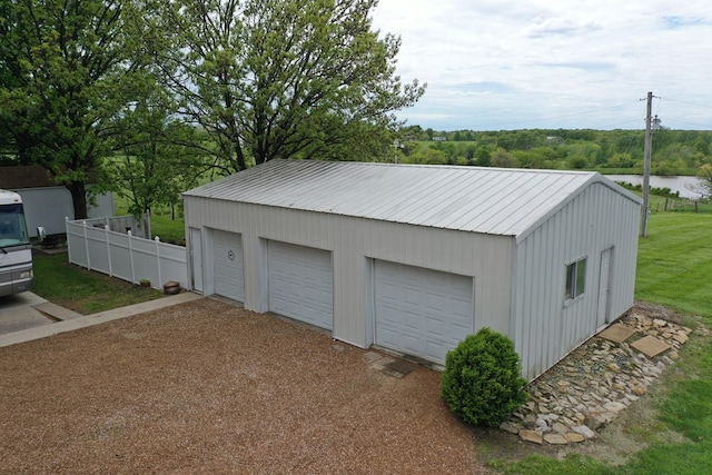 detached garage with fence