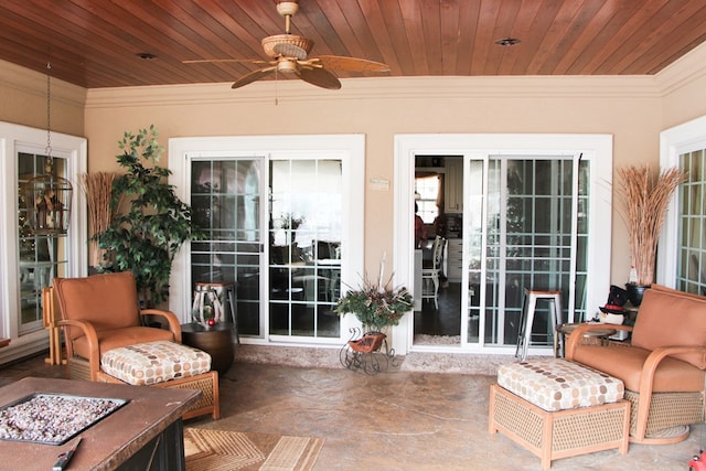 exterior space featuring wooden ceiling and ceiling fan