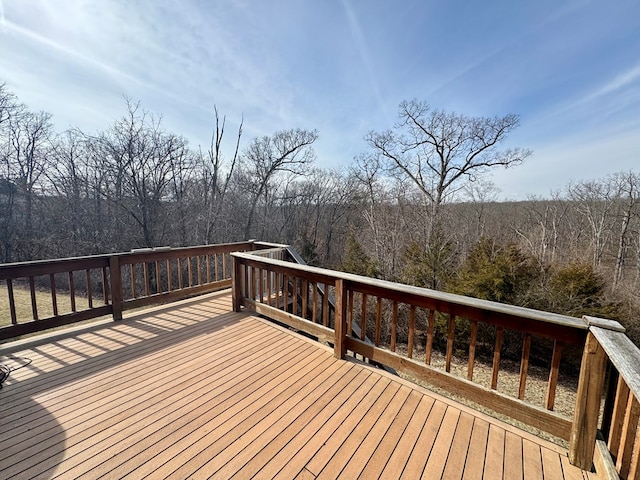 deck with a wooded view