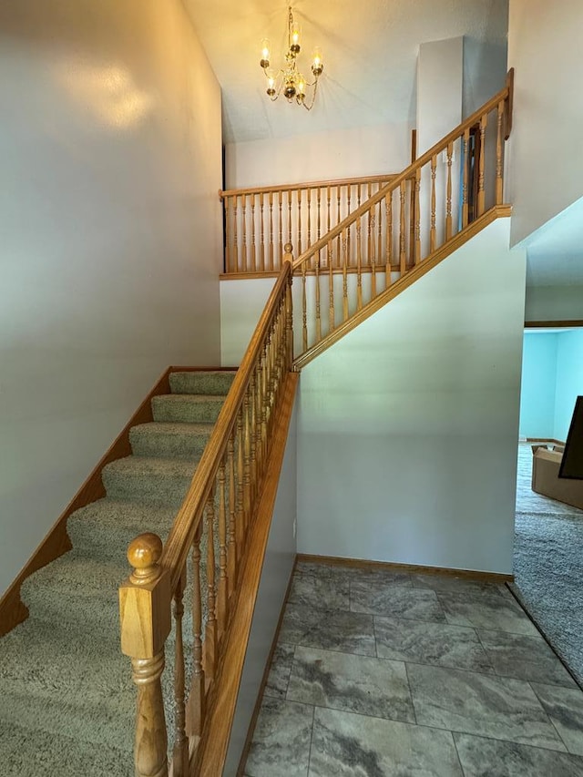 20858 Oak View Trl, Kirksville, MO 63501 - stairway with a chandelier and stone finish flooring
