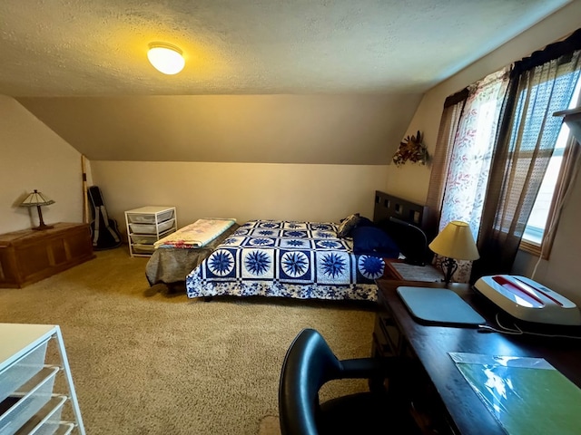 carpeted bedroom featuring a textured ceiling and lofted ceiling