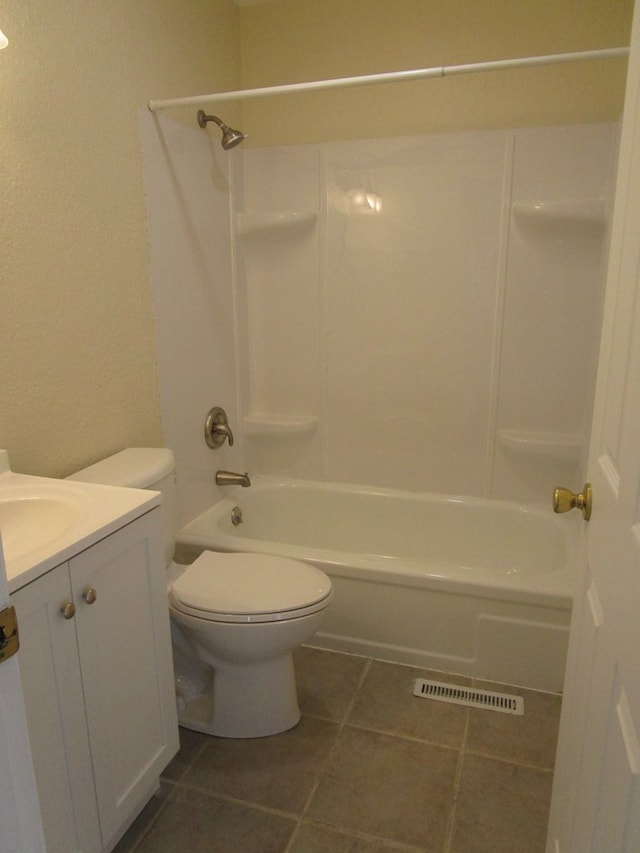 711 S Osteopathy, Kirksville, MO 63501 - bathroom with tile patterned flooring, visible vents, toilet, vanity, and  shower combination
