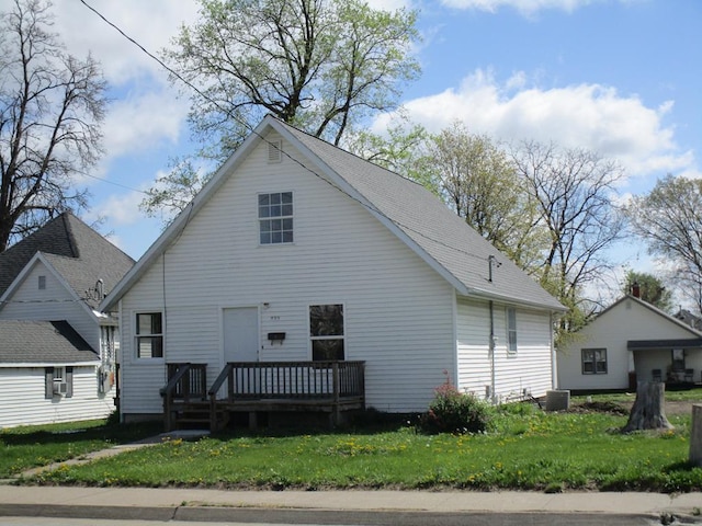 711 S Osteopathy, Kirksville, MO 63501 - rear view of property featuring a lawn and a deck