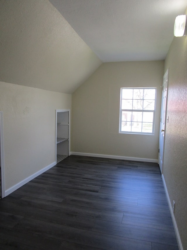 711 S Osteopathy, Kirksville, MO 63501 - bonus room featuring dark wood finished floors, vaulted ceiling, and baseboards
