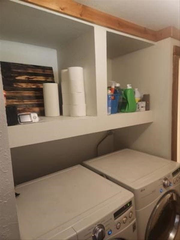 washroom with washer and clothes dryer