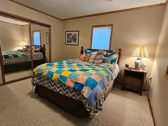 bedroom with a closet, light colored carpet, and ornamental molding