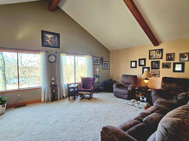 living area featuring beam ceiling, high vaulted ceiling, a textured ceiling, carpet, and baseboards