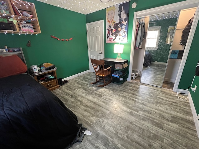 113 N Cottage Grove Ave, Kirksville, MO 63501 - bedroom featuring baseboards and wood finished floors
