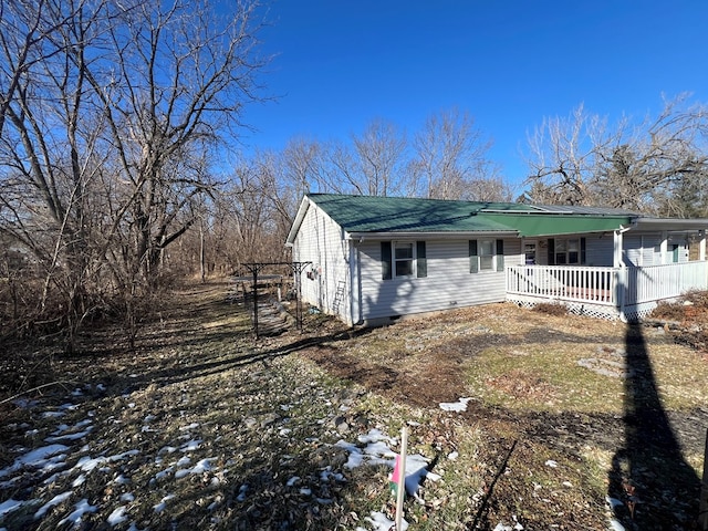 113 N Cottage Grove Ave, Kirksville, MO 63501 - view of front of home with a porch and crawl space