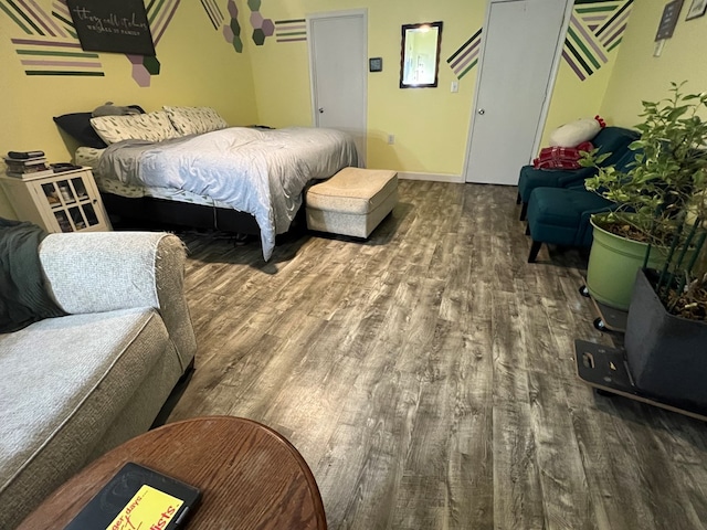 113 N Cottage Grove Ave, Kirksville, MO 63501 - bedroom with baseboards and wood finished floors