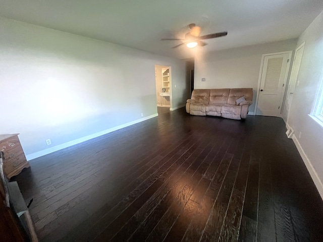 1713 Fairchild St, Chillicothe, MO 64601 - unfurnished living room featuring dark wood-type flooring and ceiling fan