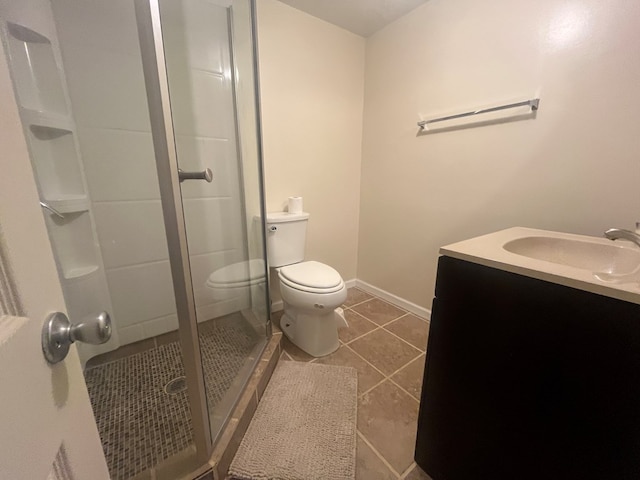 1713 Fairchild St, Chillicothe, MO 64601 - bathroom with a shower stall, vanity, and tile patterned flooring