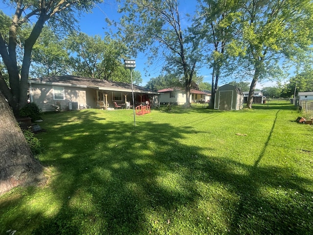 1713 Fairchild St, Chillicothe, MO 64601 - view of yard featuring a shed