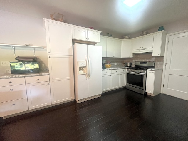 1713 Fairchild St, Chillicothe, MO 64601 - kitchen featuring white refrigerator with ice dispenser, stainless steel gas stove, under cabinet range hood, white cabinetry, and tasteful backsplash