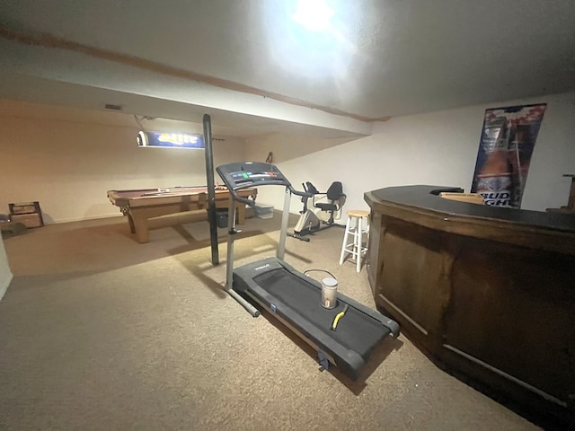 1713 Fairchild St, Chillicothe, MO 64601 - exercise room featuring carpet floors and a bar