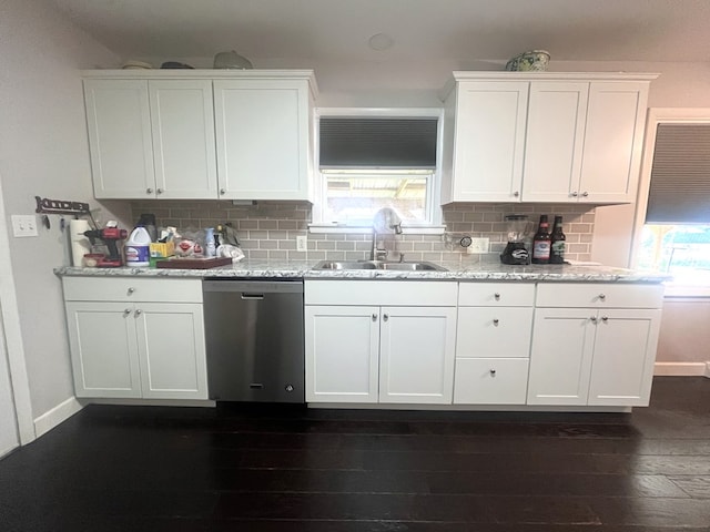 1713 Fairchild St, Chillicothe, MO 64601 - kitchen featuring dishwasher, white cabinets, tasteful backsplash, dark wood-style flooring, and light stone countertops