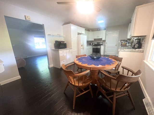 1713 Fairchild St, Chillicothe, MO 64601 - dining area featuring dark wood finished floors and a ceiling fan