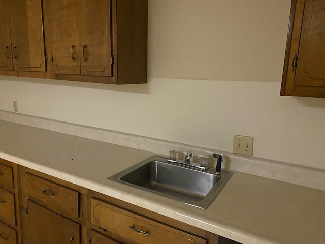 911 Cherry St, Chillicothe, MO 64601 - kitchen with light countertops and a sink