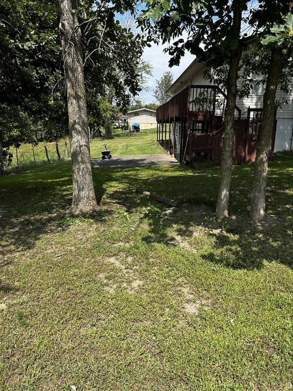 803 Coates St, Macon, MO 63552 - view of yard featuring a deck
