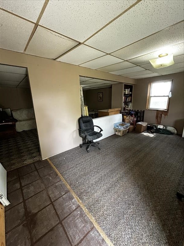 803 Coates St, Macon, MO 63552 - interior space featuring a drop ceiling and carpet