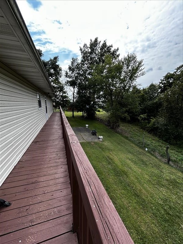 803 Coates St, Macon, MO 63552 - wooden deck with a lawn