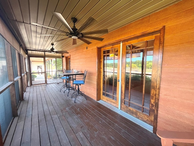 exterior space featuring a ceiling fan