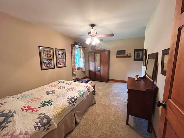 bedroom with baseboards, ceiling fan, and light colored carpet