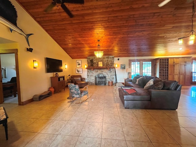 living area with high vaulted ceiling, wooden ceiling, a fireplace, and light tile patterned floors