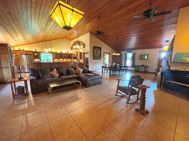 living room featuring light tile patterned floors, wood ceiling, high vaulted ceiling, and a ceiling fan