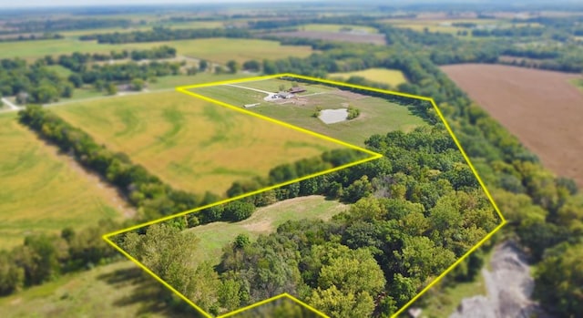 birds eye view of property featuring a rural view