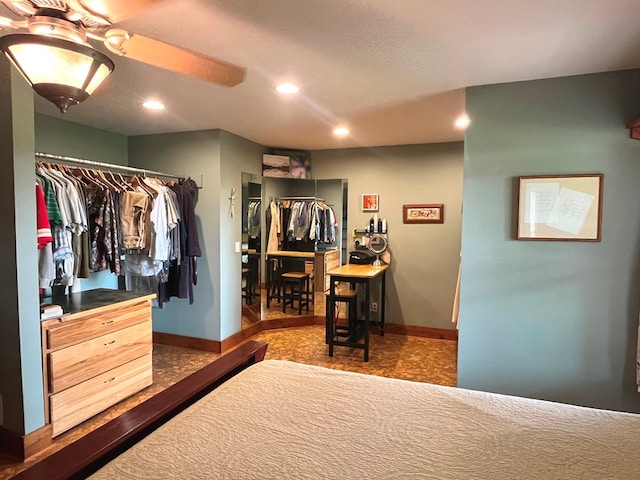 bedroom featuring baseboards, ceiling fan, a closet, and recessed lighting