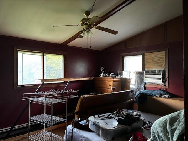 26462 Haven Way, Kirksville, MO 63501 - bedroom featuring lofted ceiling, multiple windows, cooling unit, and a ceiling fan