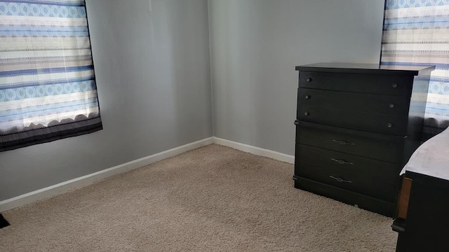 1408 S Downing, Kirksville, MO 63501 - unfurnished bedroom with carpet and baseboards