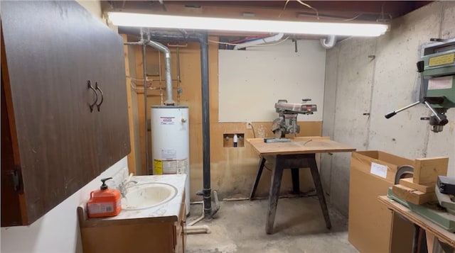 1201 Maffry St, Macon, MO 63552 - unfinished basement featuring a sink, water heater, and a workshop area