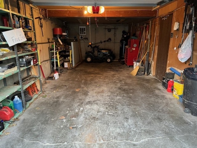1201 Maffry St, Macon, MO 63552 - garage featuring a garage door opener