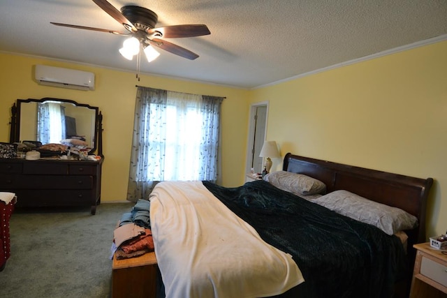 1719 N Osteopathy, Kirksville, MO 63501 - bedroom with an AC wall unit, ornamental molding, carpet, ceiling fan, and a textured ceiling