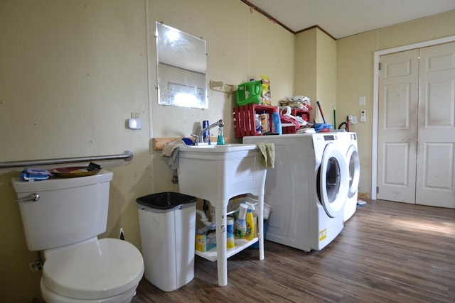 1719 N Osteopathy, Kirksville, MO 63501 - laundry room featuring washer / clothes dryer and wood finished floors