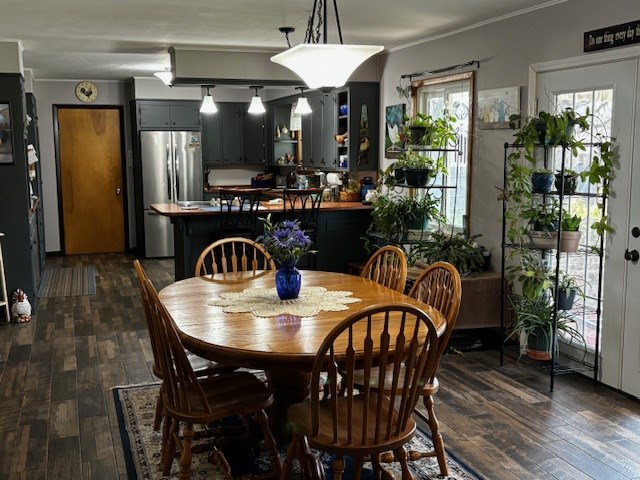 2 Center Dr, Kirksville, MO 63501 - dining room with crown molding and dark wood-style flooring