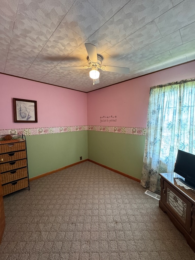 810 S W St, Green City, MO 63545 - spare room featuring carpet, ceiling fan, and baseboards