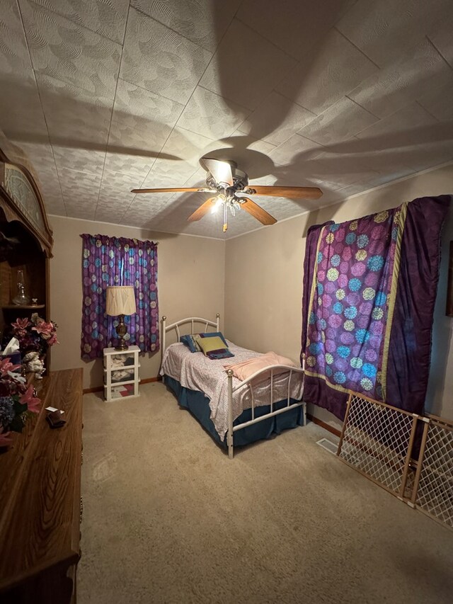 810 S W St, Green City, MO 63545 - carpeted bedroom with ceiling fan and baseboards