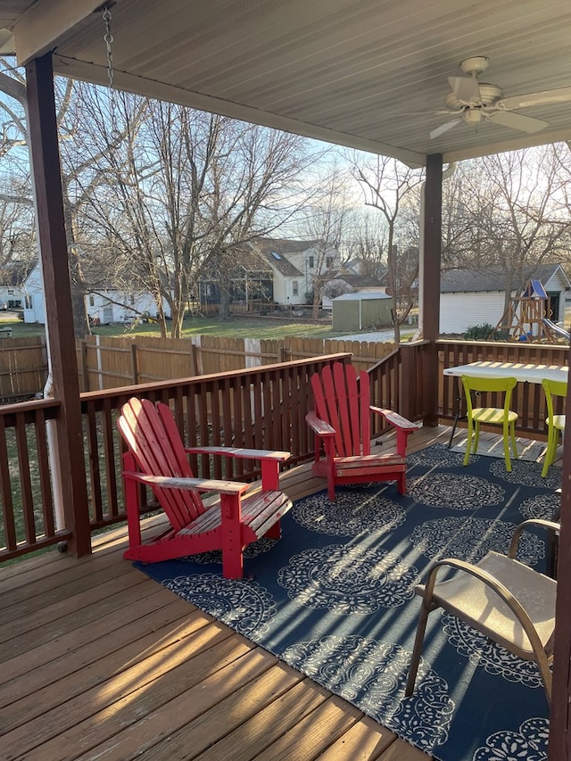 814 E Normal St, Kirksville, MO 63501 - wooden deck featuring fence, a ceiling fan, and a residential view