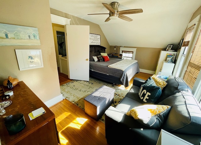 814 E Normal St, Kirksville, MO 63501 - bedroom featuring baseboards, wood finished floors, ceiling fan, and vaulted ceiling